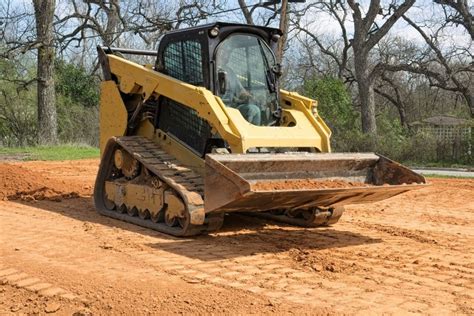 dirt work with skid steer|grade with a skid steer.